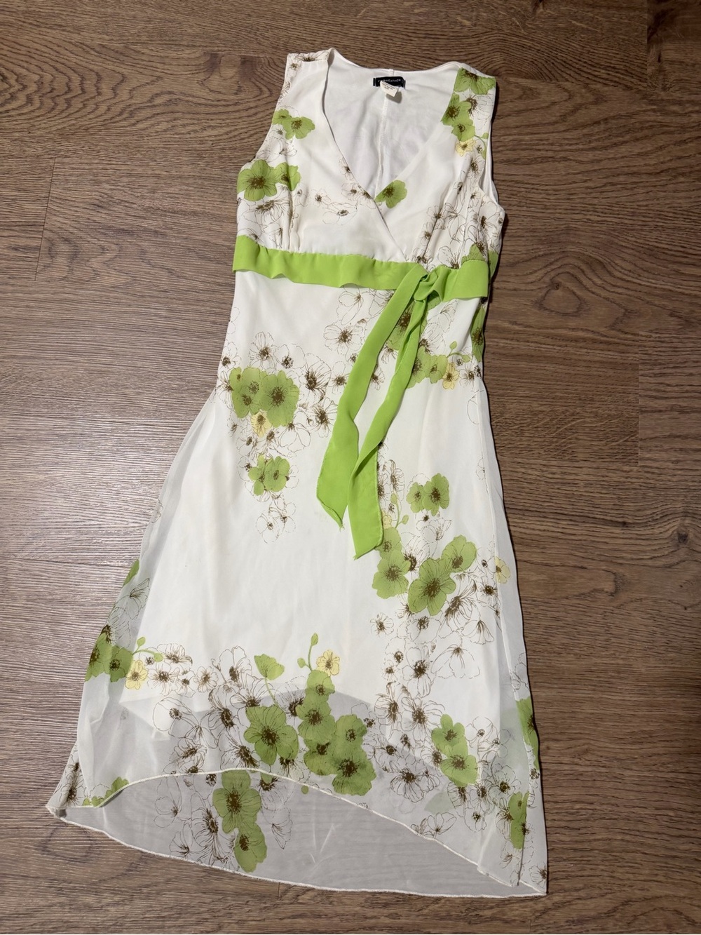 Sleeveless White Floral High-Low Dress with Green Accents